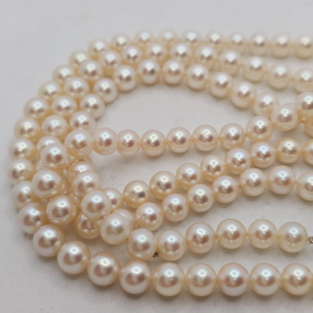 Akoya Pearl necklace 105cm long with 5mm white pink pearls and 10 karat white gold clasp