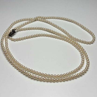 Oyster pearl long necklace 105cm with 2 strands of white Akoya baby pearls and silver clasp