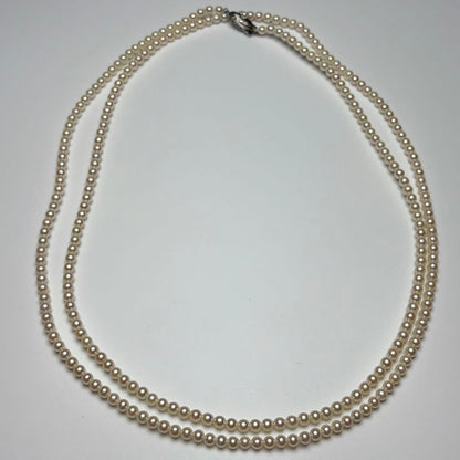 Oyster pearl long necklace 105cm with 2 strands of white Akoya baby pearls and silver clasp