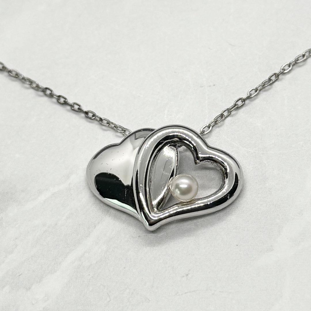 Mikimoto Akoya Pearl single pearl necklace pendant in silver with double heart design on 40 cm chain