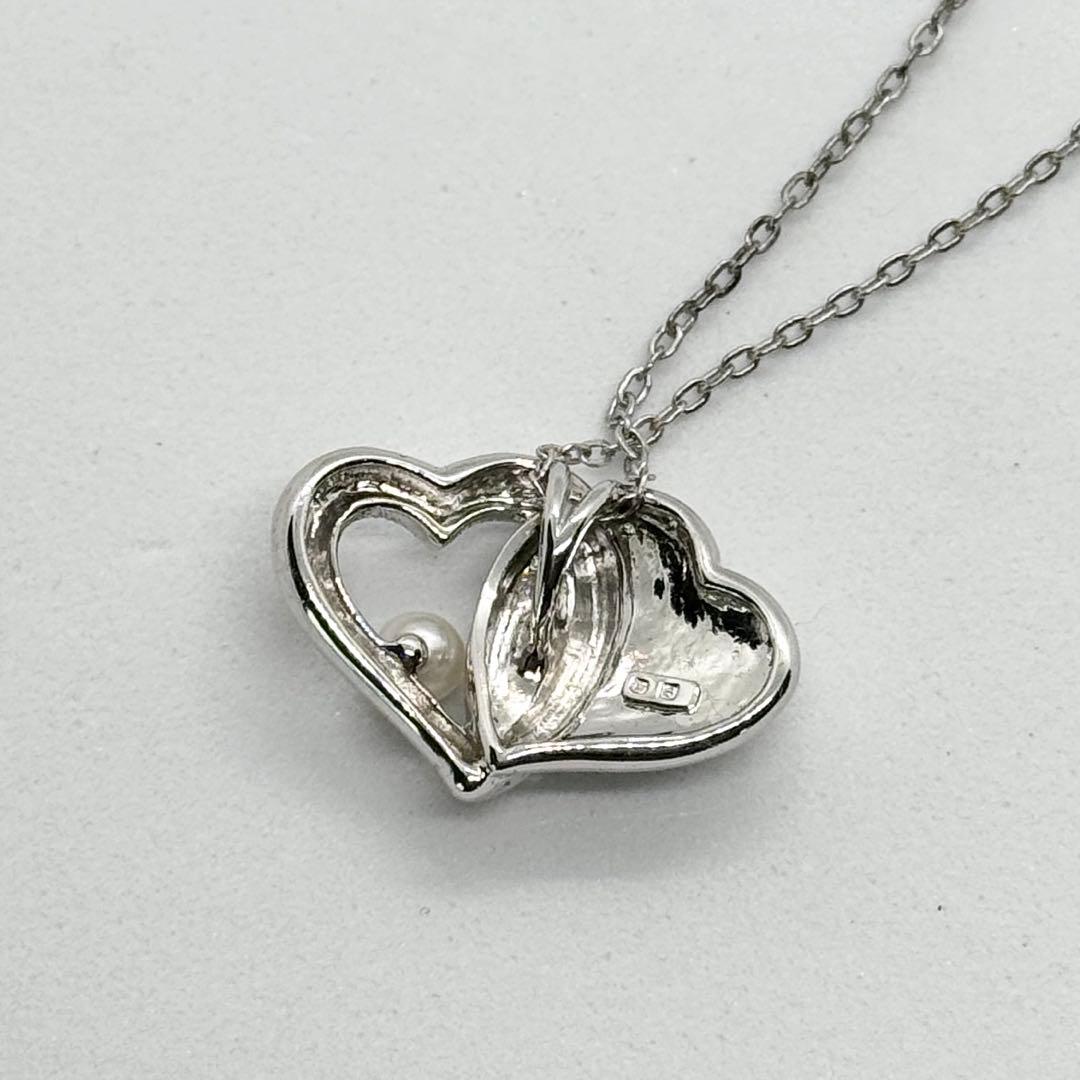 Mikimoto Akoya Pearl single pearl necklace pendant in silver with double heart design on 40 cm chain