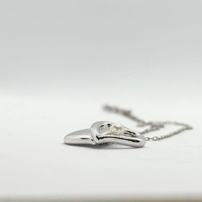 Mikimoto Akoya Pearl single pearl necklace pendant in silver with double heart design on 40 cm chain