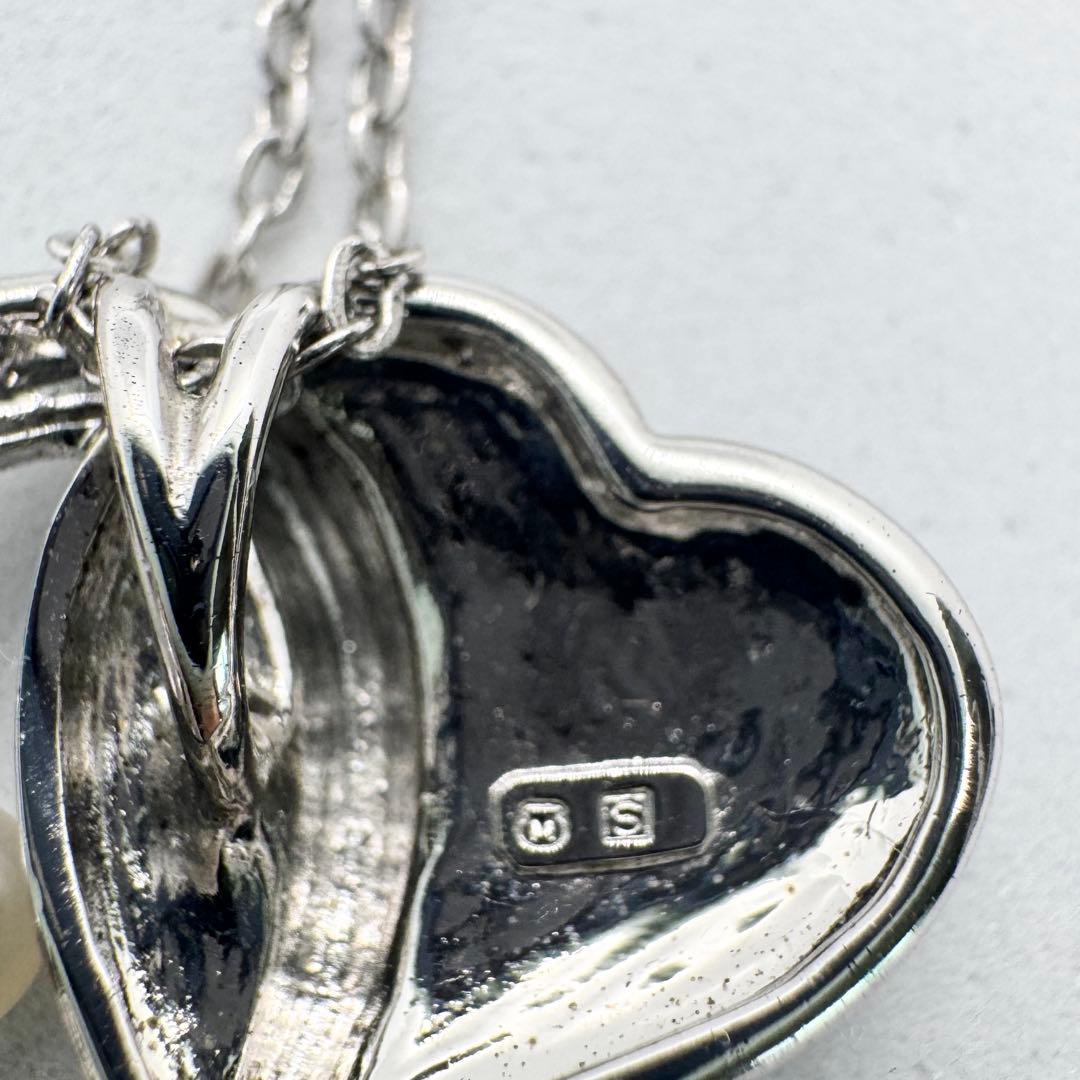 Mikimoto Akoya Pearl single pearl necklace pendant in silver with double heart design on 40 cm chain