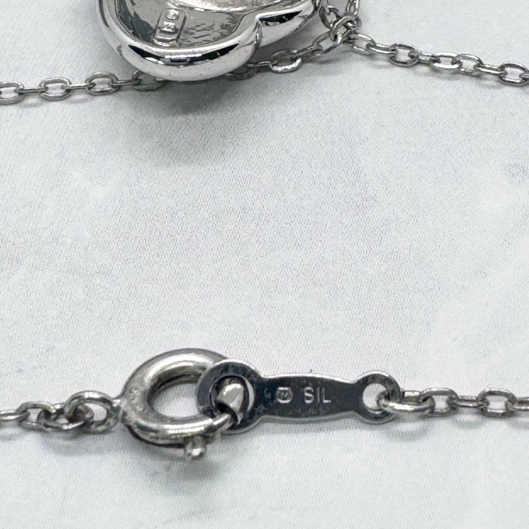 Mikimoto Akoya Pearl single pearl necklace pendant in silver with double heart design on 40 cm chain