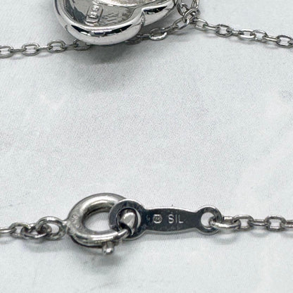 Mikimoto Akoya Pearl single pearl necklace pendant in silver with double heart design on 40 cm chain