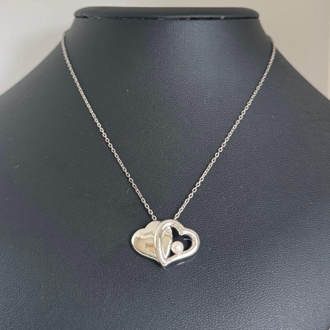 Mikimoto Akoya Pearl single pearl necklace pendant in silver with double heart design on 40 cm chain