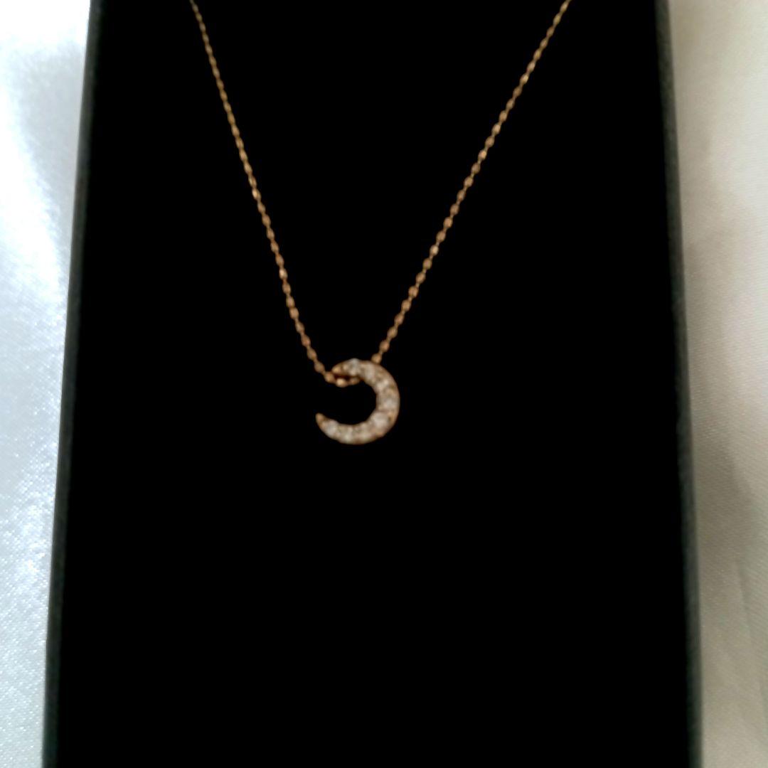 Agete Crescent Moon Diamond Necklace with gold chain and moon-shaped diamond pendant