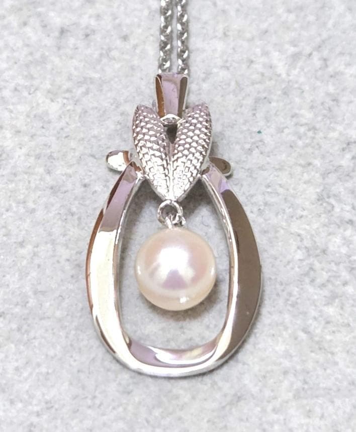 Mikimoto Pearl Silver Necklace 43345 featuring round white pearls on silver chain from Japan