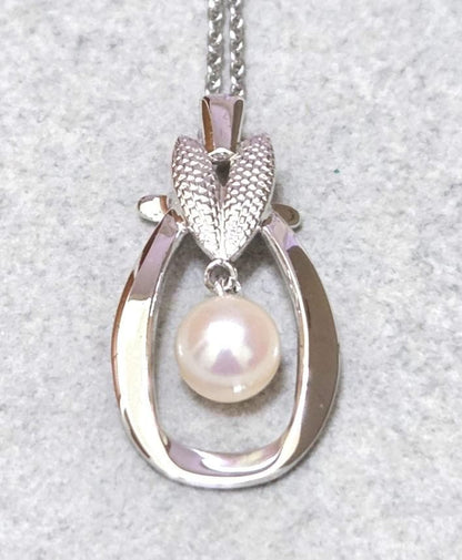 Mikimoto Pearl Silver Necklace 43345 featuring round white pearls on silver chain from Japan