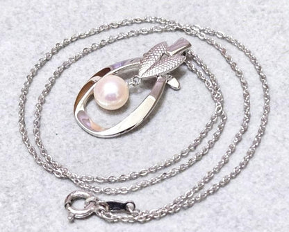 Mikimoto Pearl Silver Necklace 43345 featuring round white pearls on silver chain from Japan