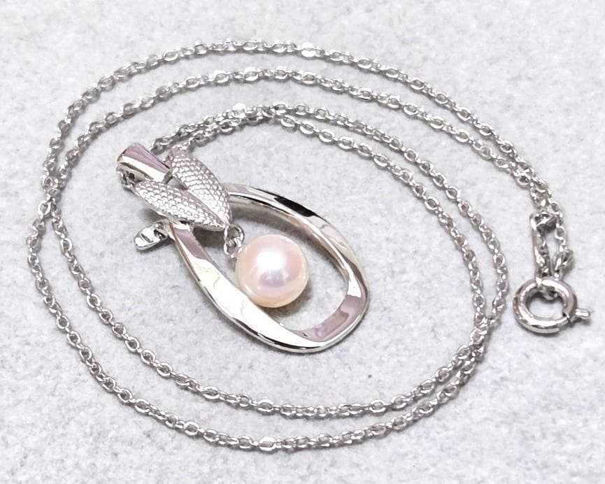Mikimoto Pearl Silver Necklace 43345 featuring round white pearls on silver chain from Japan