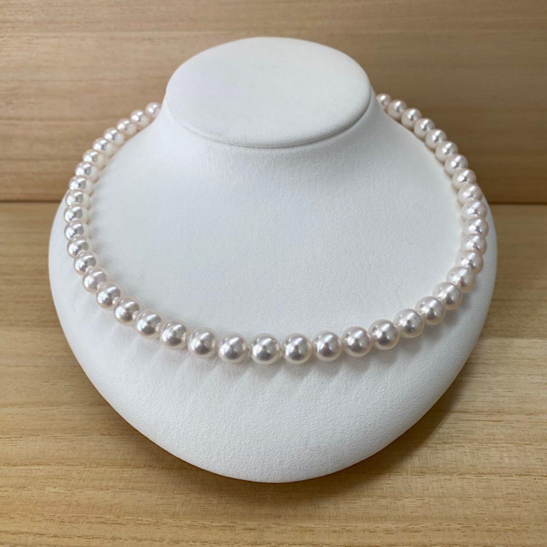 Akoya pearl necklace with 50 iridescent white pearls sized 8.0-8.5mm on silver clasp
