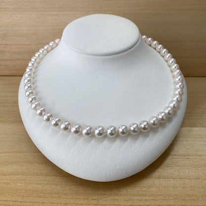 Akoya pearl necklace with 50 iridescent white pearls sized 8.0-8.5mm on silver clasp
