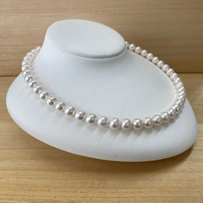 Akoya pearl necklace with 50 iridescent white pearls sized 8.0-8.5mm on silver clasp