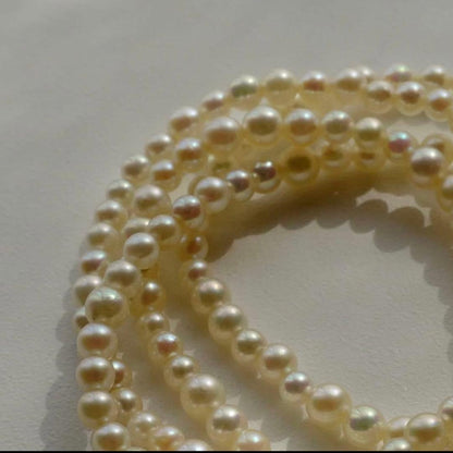 New Akoya pearl necklace featuring very small 3.0-2.0 mm baby mustard seed pearls, 44 cm length