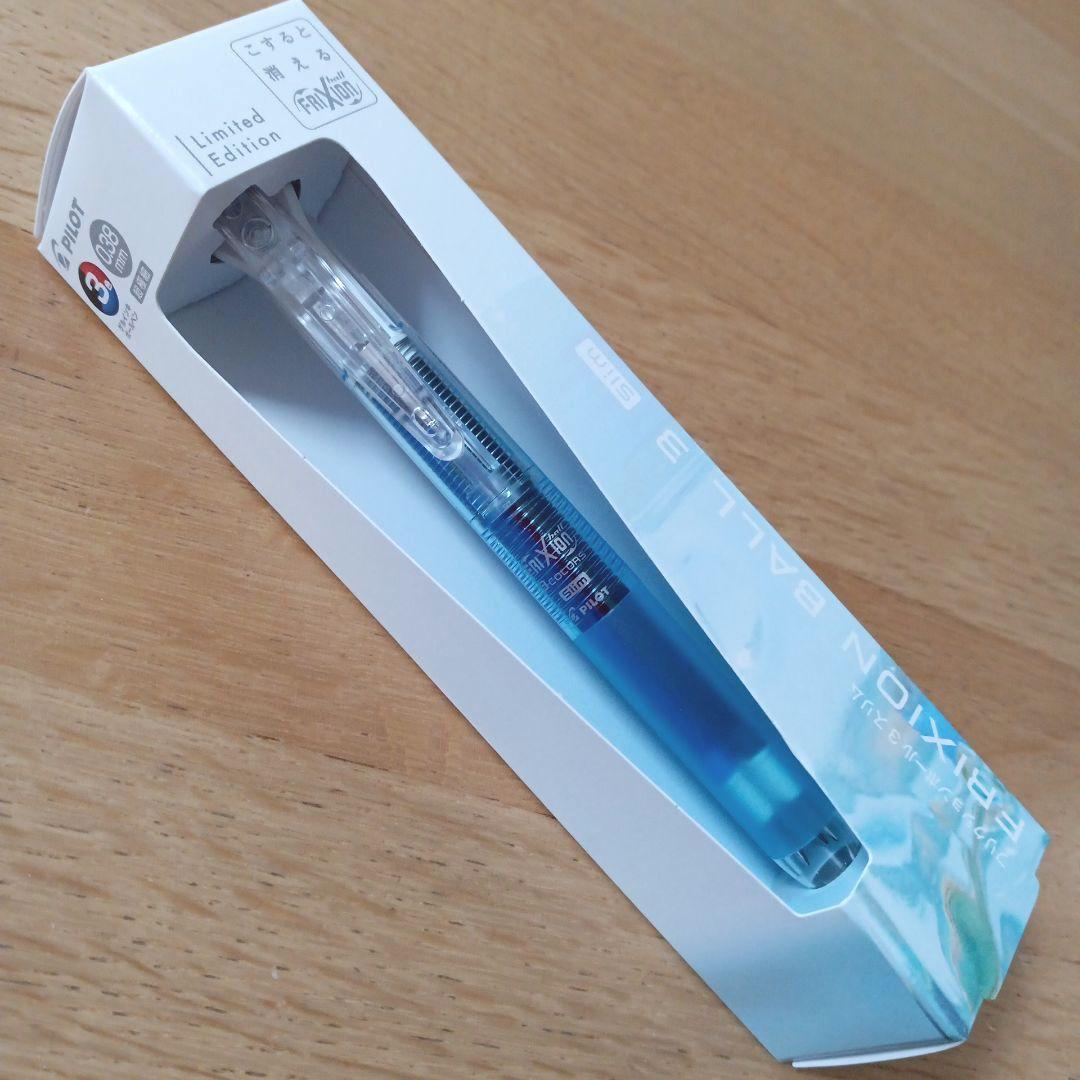 Pilot Frixion Ball 3 Slim multi-color pen with 0.38mm tip and light blue body showing black red and blue ink colors