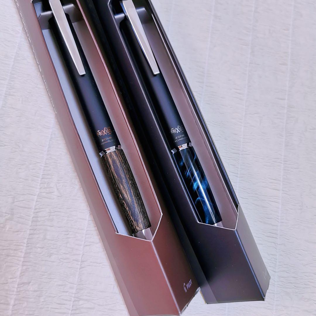 Frixion Ball Knock Zone pen set with click mechanism, 0.5mm tip, black ink, and marble grip in green and brown colors