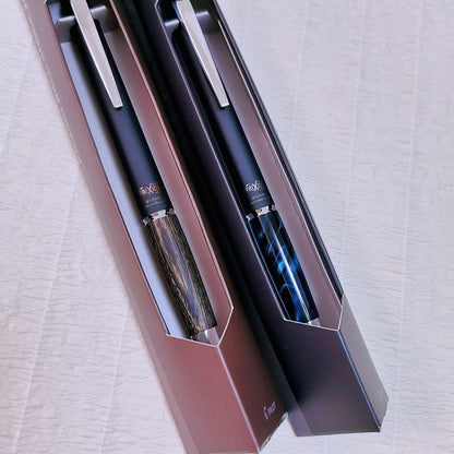 Frixion Ball Knock Zone pen set with click mechanism, 0.5mm tip, black ink, and marble grip in green and brown colors
