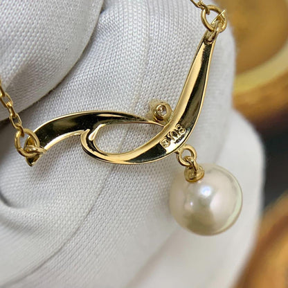 Mikimoto K18 yellow gold Akoya pearl necklace with 7.4mm pearl and diamond pendant on 42cm chain