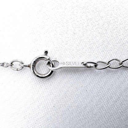 TASAKI Pearl Ribbon Necklace with 6.7mm Akoya pearl, 0.02ct diamond, and 40cm silver chain