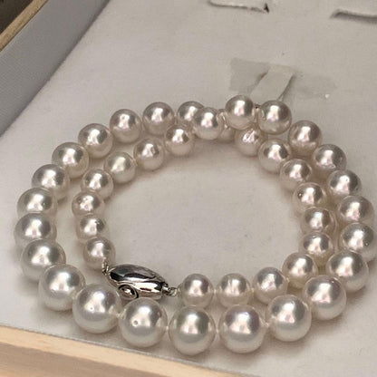 White pearl necklace with large 8.1-11.2mm pearls on a 45cm silver chain