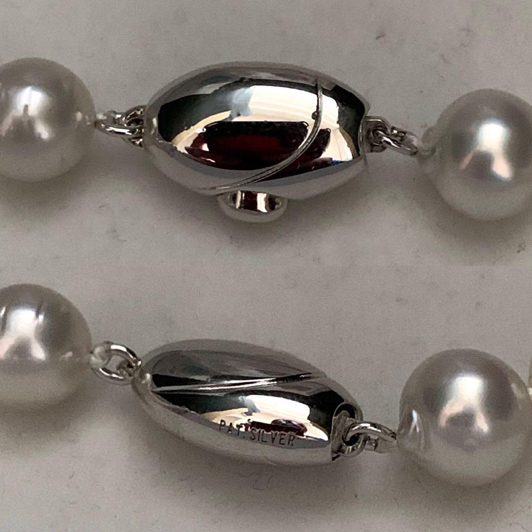White pearl necklace with large 8.1-11.2mm pearls on a 45cm silver chain