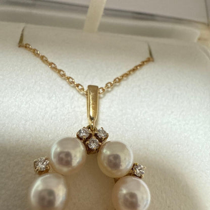 Mikimoto Pearl Diamond Necklace with 5.4mm pearl set in K18 yellow gold weighing 4.8 grams