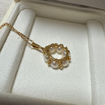Mikimoto Pearl Diamond Necklace with 5.4mm pearl set in K18 yellow gold weighing 4.8 grams