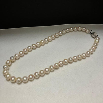 Akoya pearl necklace with large 9-9.5mm semi-round pearls and flower motif clasp
