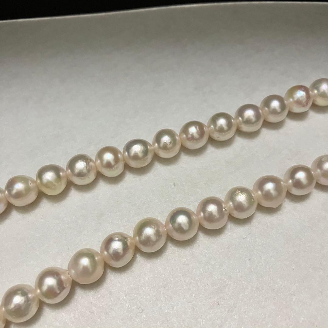 Akoya pearl necklace with large 9-9.5mm semi-round pearls and flower motif clasp