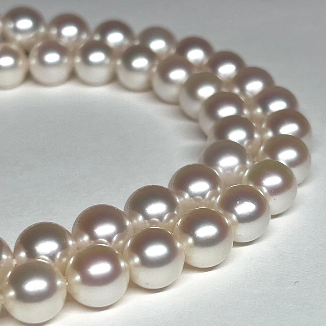 Pearl necklace featuring 7.5-8mm Akoya pearls with a K14 white gold clasp and certificate