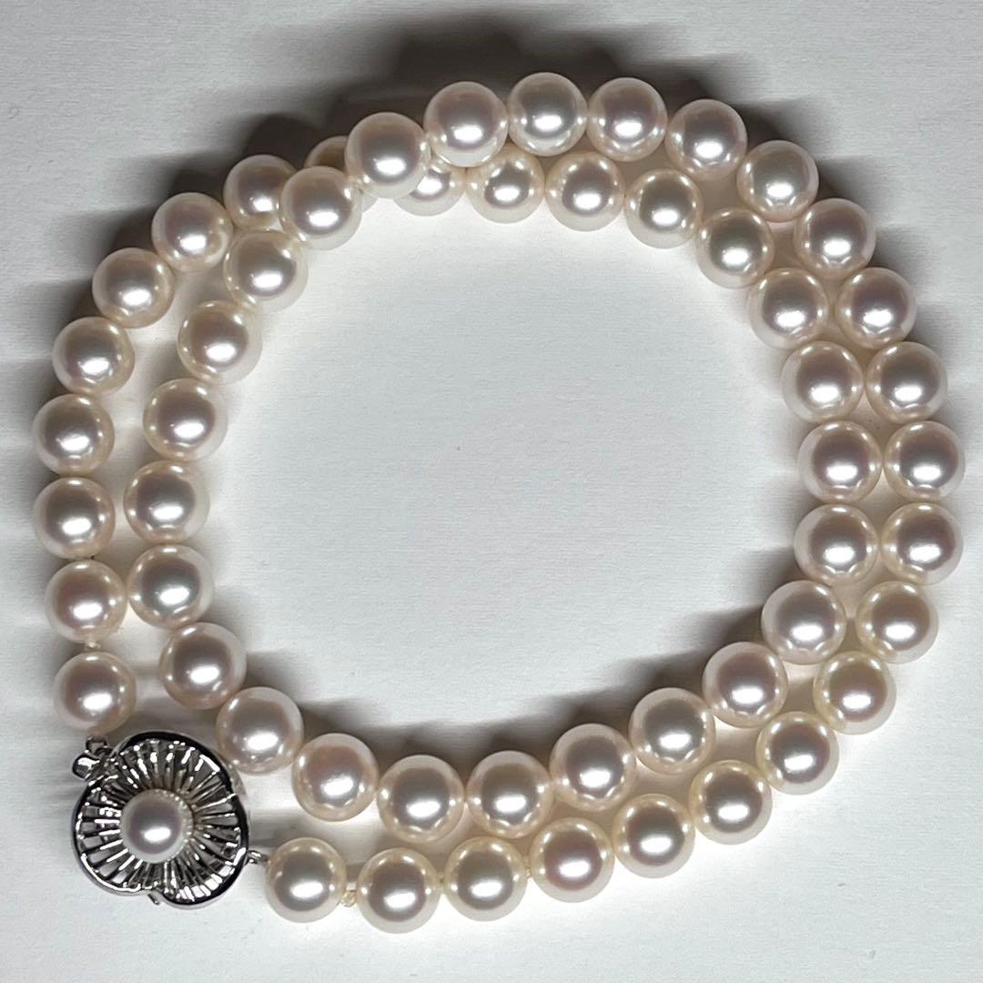 Pearl necklace featuring 7.5-8mm Akoya pearls with a K14 white gold clasp and certificate