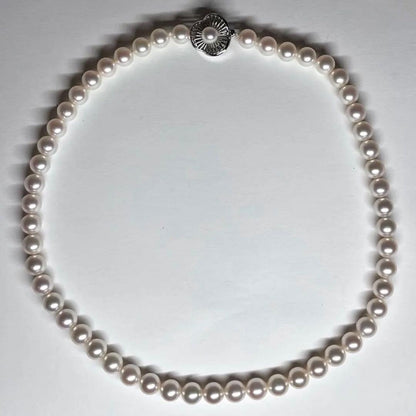 Pearl necklace featuring 7.5-8mm Akoya pearls with a K14 white gold clasp and certificate