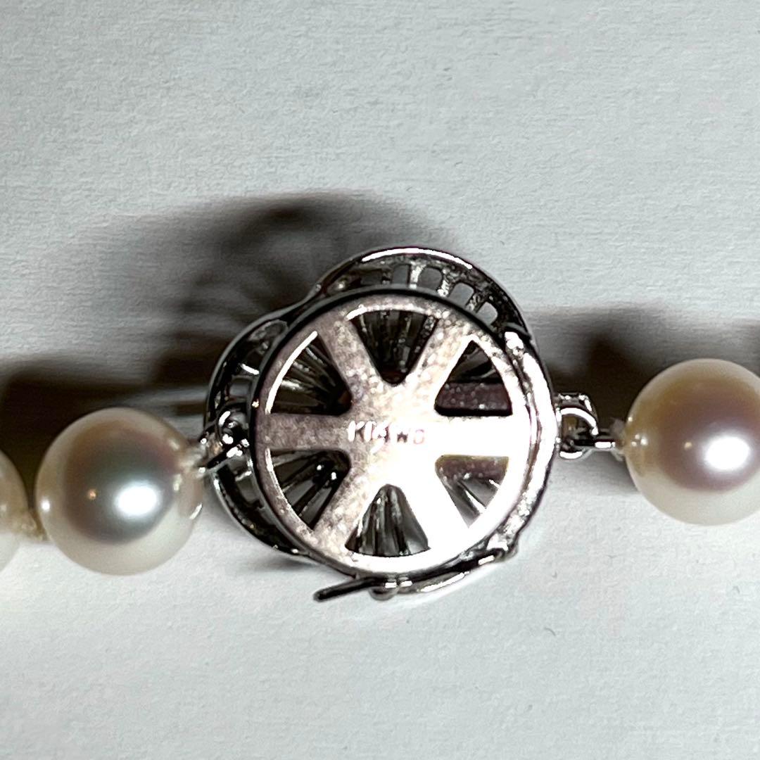 Pearl necklace featuring 7.5-8mm Akoya pearls with a K14 white gold clasp and certificate