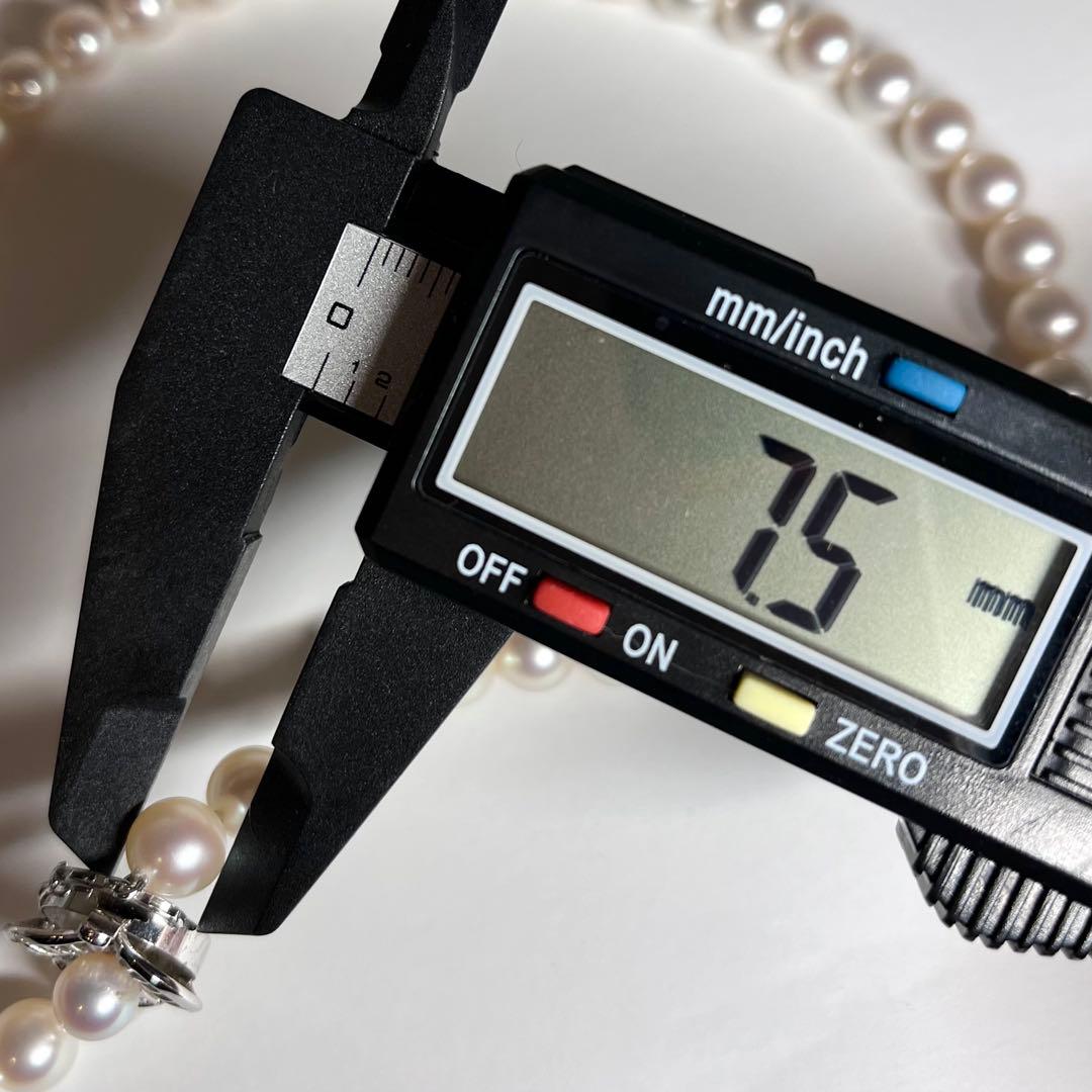 Pearl necklace featuring 7.5-8mm Akoya pearls with a K14 white gold clasp and certificate