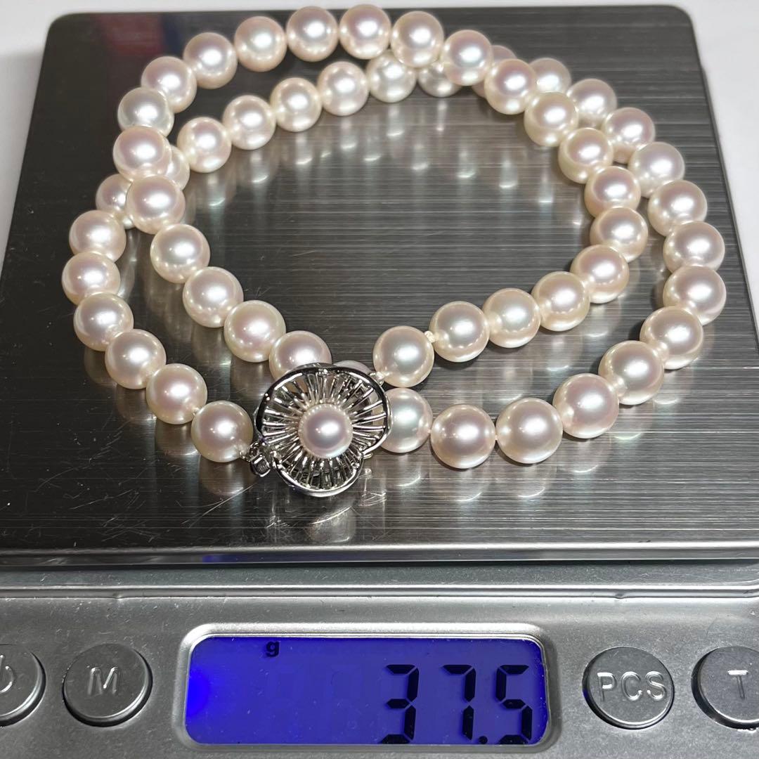 Pearl necklace featuring 7.5-8mm Akoya pearls with a K14 white gold clasp and certificate