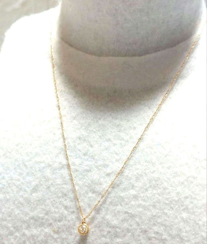 Agete K18 diamond pendant necklace featuring 0.15ct diamond on a delicate link chain