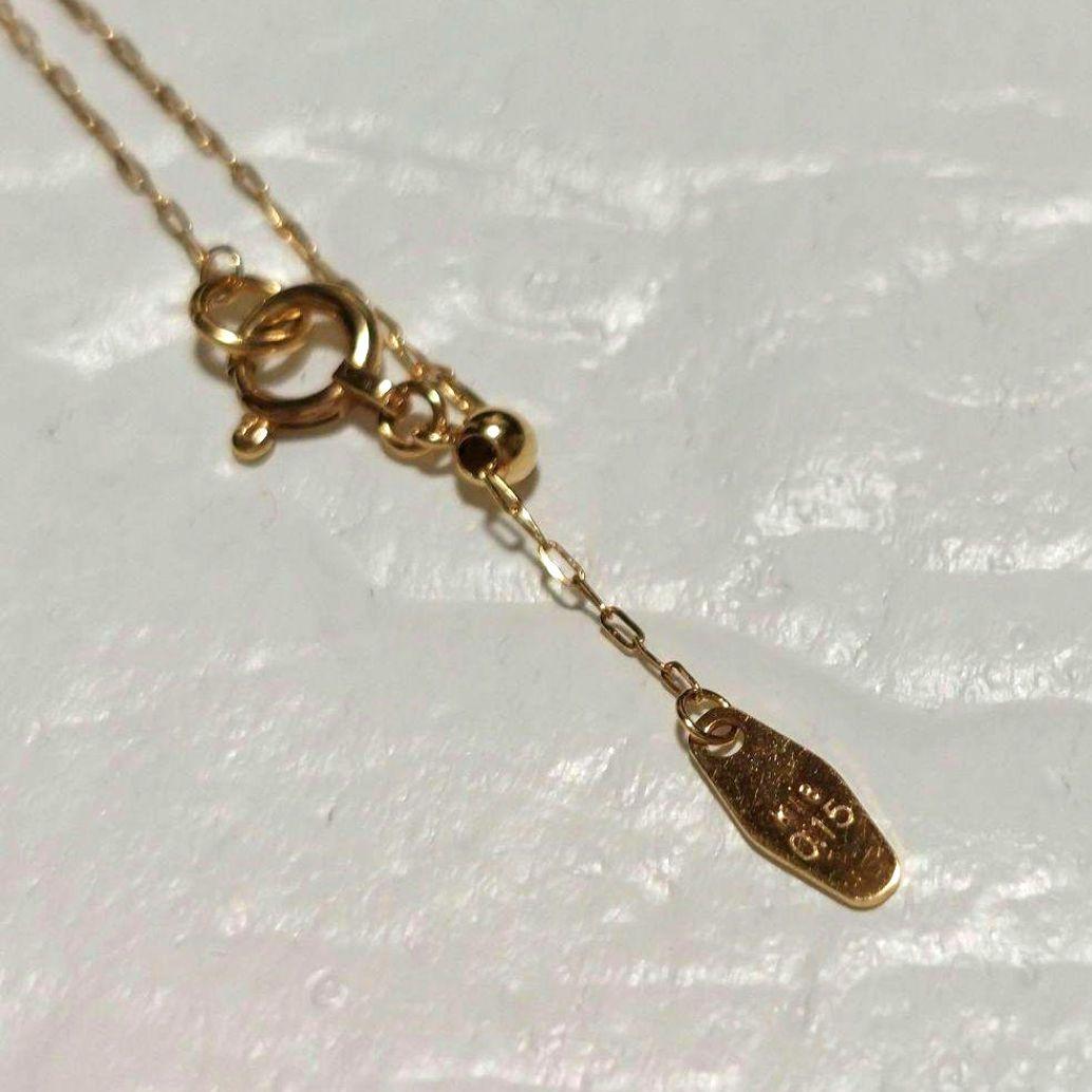 Agete K18 diamond pendant necklace featuring 0.15ct diamond on a delicate link chain