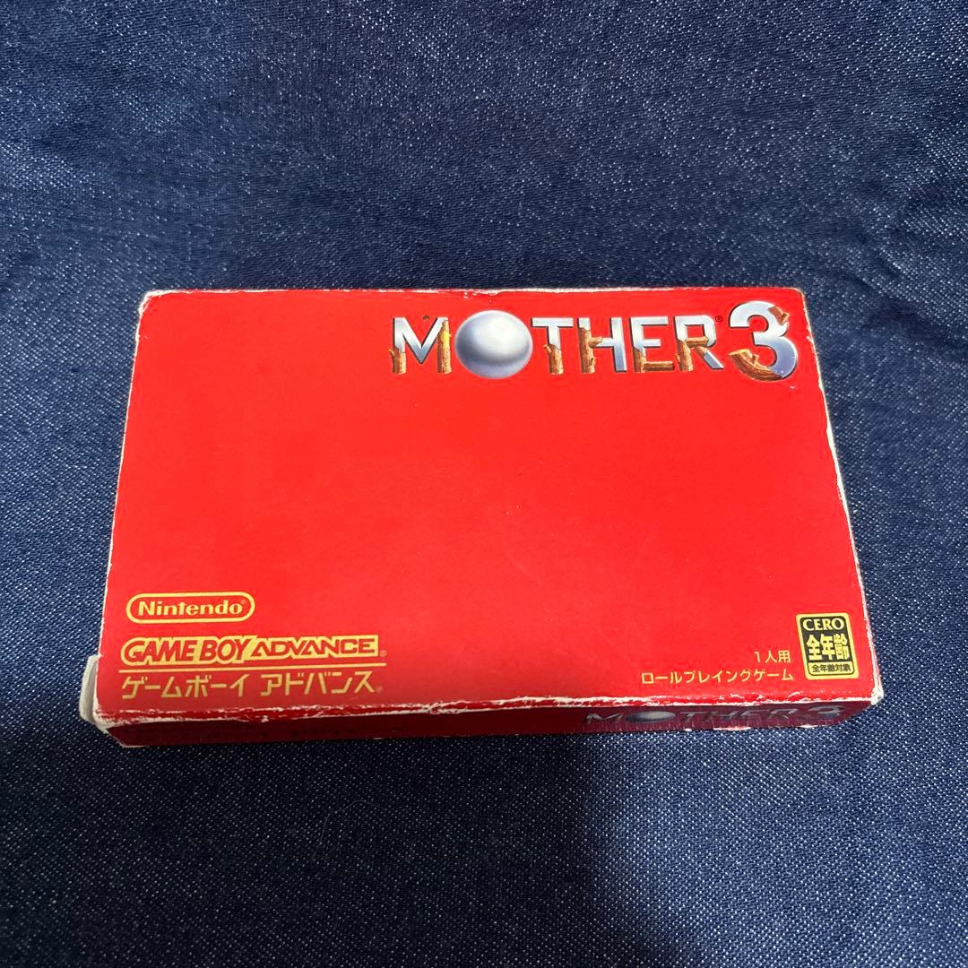 Mother 3 Nintendo software with paper tray, instruction manual, and outer box in used condition
