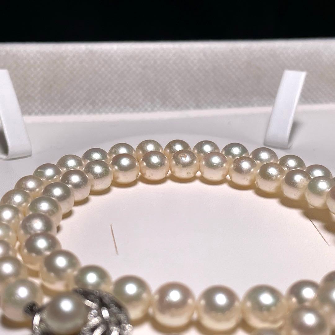 Auspicious Akoya Pearl Necklace with 6.5-7.0mm round white pearls on a silver chain, 40.6cm length