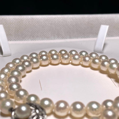 Auspicious Akoya Pearl Necklace with 6.5-7.0mm round white pearls on a silver chain, 40.6cm length
