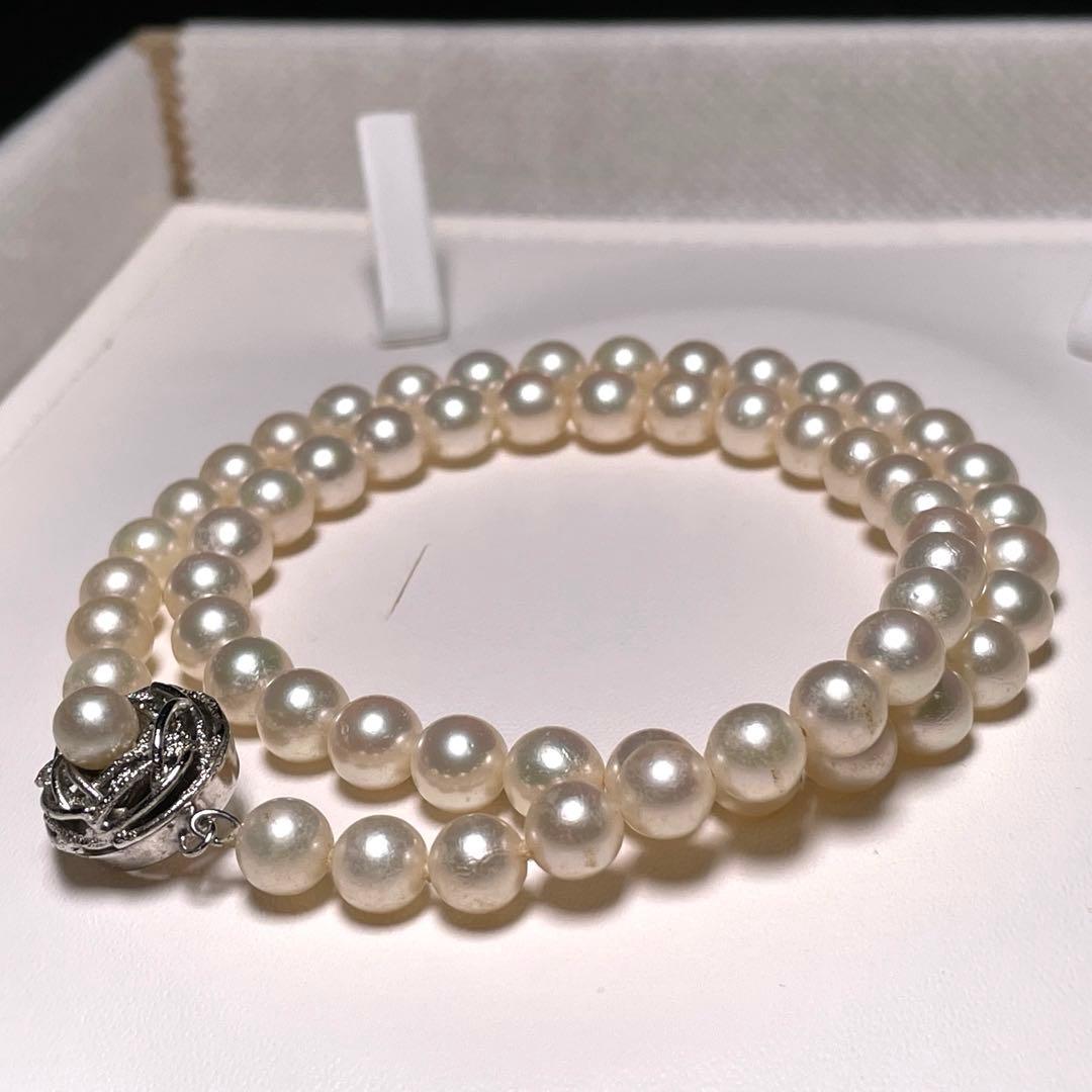 Auspicious Akoya Pearl Necklace with 6.5-7.0mm round white pearls on a silver chain, 40.6cm length