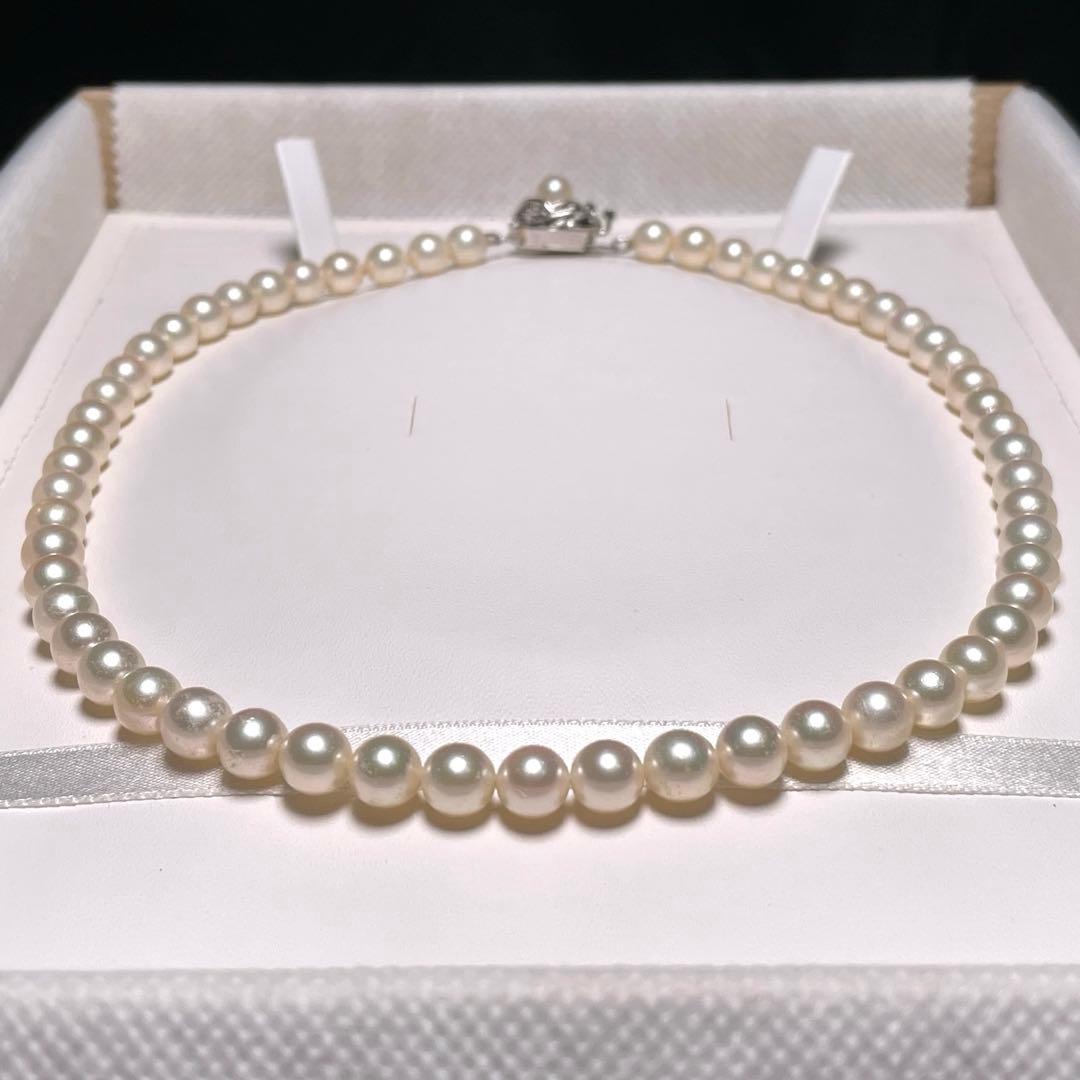 Auspicious Akoya Pearl Necklace with 6.5-7.0mm round white pearls on a silver chain, 40.6cm length