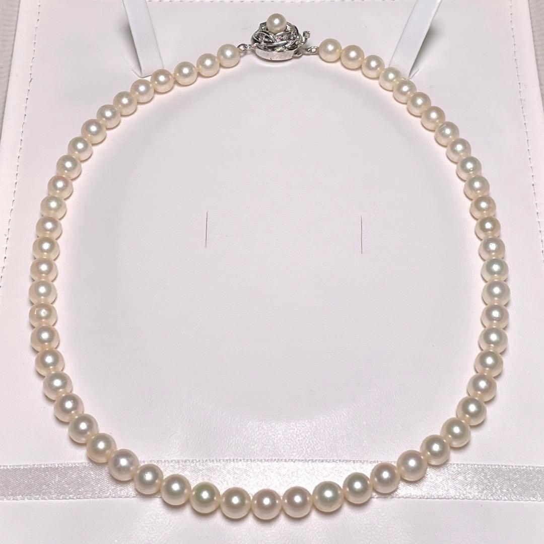 Auspicious Akoya Pearl Necklace with 6.5-7.0mm round white pearls on a silver chain, 40.6cm length