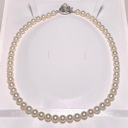 Auspicious Akoya Pearl Necklace with 6.5-7.0mm round white pearls on a silver chain, 40.6cm length