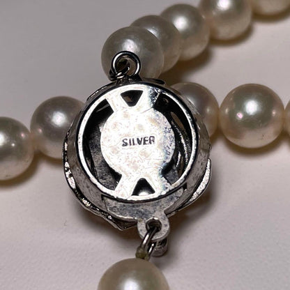 Auspicious Akoya Pearl Necklace with 6.5-7.0mm round white pearls on a silver chain, 40.6cm length