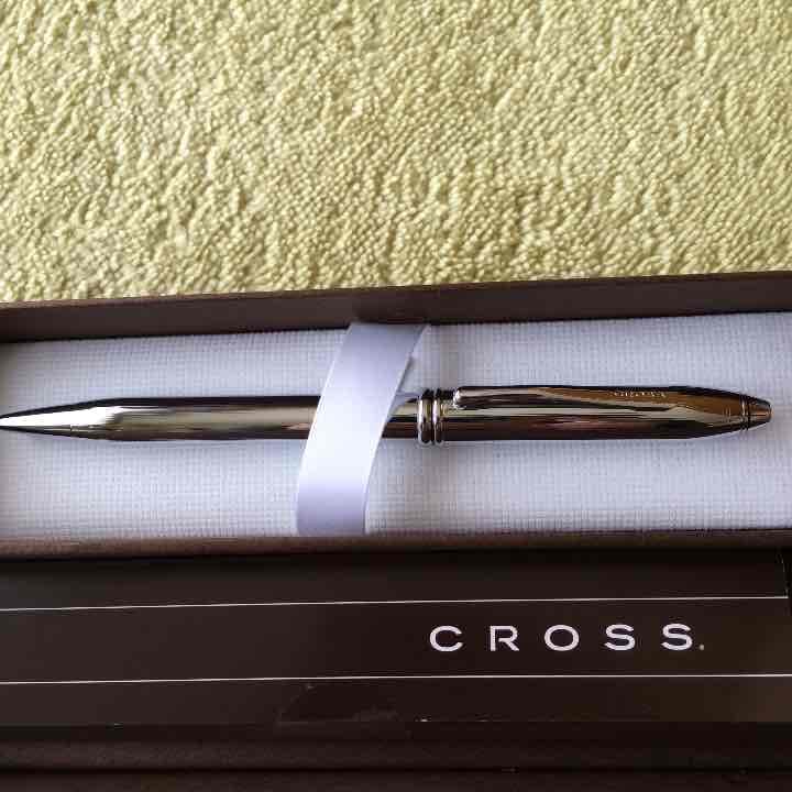 New unused Cross Ballpoint Pen in its original box with sleek silver and black design
