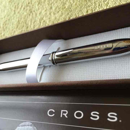 New unused Cross Ballpoint Pen in its original box with sleek silver and black design