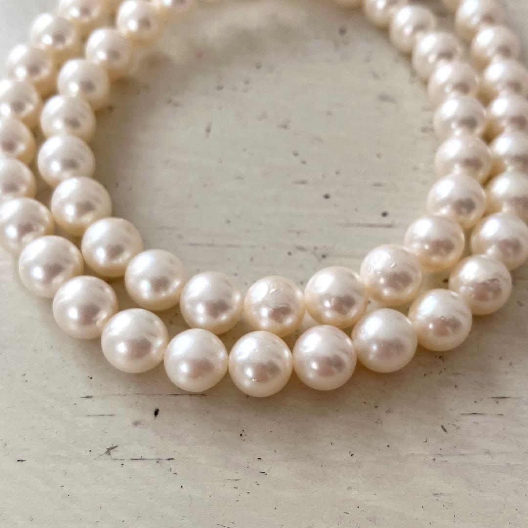 Akoya pearl necklace in silver with 6mm pearls and 44cm length displayed on white background