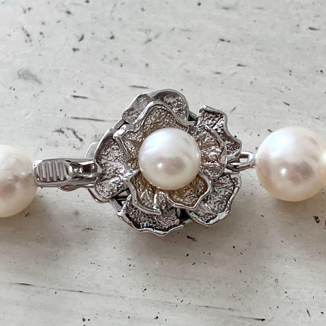 Akoya pearl necklace in silver with 6mm pearls and 44cm length displayed on white background